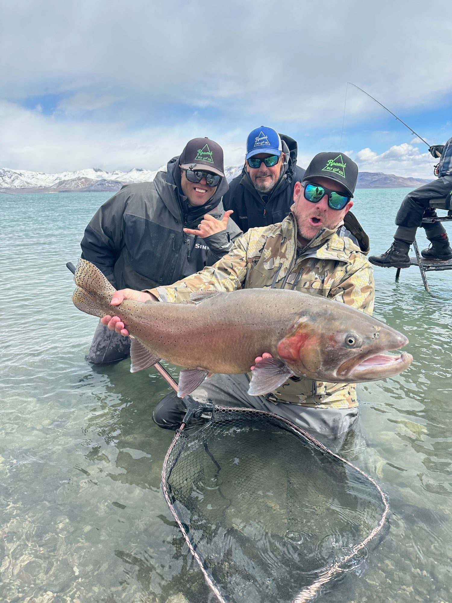 Guides from pyramid fly co at pyramid lake in nevada holding a giant lahontan cutthroat trout over 20 pounds